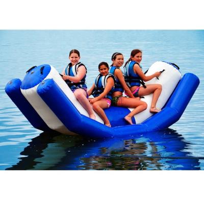 China hot sale 0.6mm pvc tarpaulin summer water games lake and sea water play seesaw floating inflatable boat for water park for sale