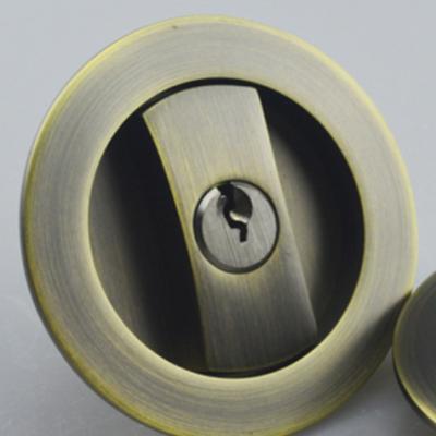 China Wooden/iron material zinc alloy lock door bolt sliding door anqitue round brass color design for wooden doors for sale