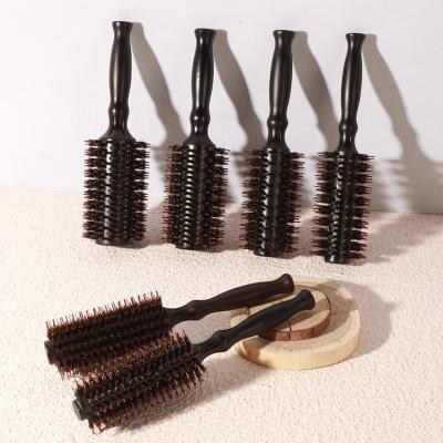 China High Quality Wooden Black Curly Hair Detangler Round Pad Salon Brush In Comb With Boar Hair for sale