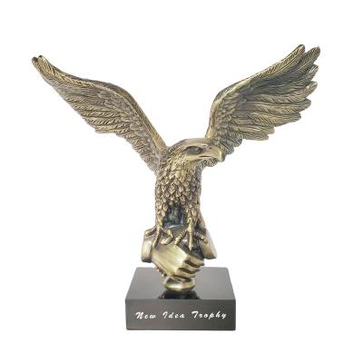 China High Quality Stylish China Metal Golden Eagle Trophy With Metal Base Glass Trophy For Awards for sale