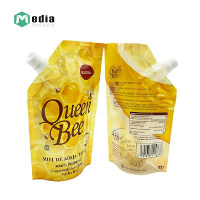 China Customized Standing Clear Window Plastic Packaging Bag Spout Plastic Bag for Honey for sale