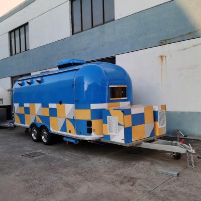 China UKUNG Standard 5.8m Luxury Handmade Australian Airstream Food Trailer With Blue Paint And Customized Stickers for sale