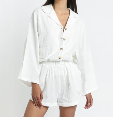 China Casual Oversized Fitted Buttons Batwing Upper Waist Roomy Elastic Pockets Sleeve Shorts Salon Wear Women Set for sale