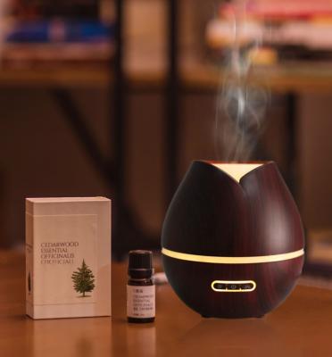 China RV Household Wood Grain Base Essential Oil Diffuser Ultrasonic Aroma Diffuser Humidifier with LED for sale