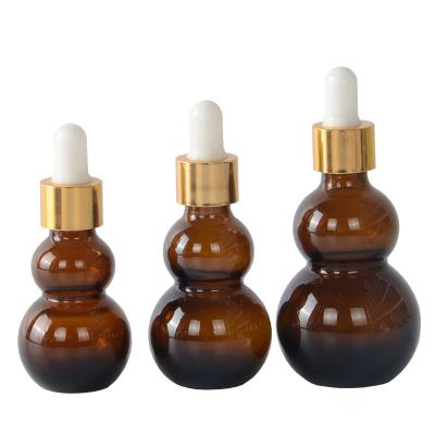 China Personal Care Factory Supply Essential Oil Bottles, Double Squash Glass Bottles, Brown, Cosmetic Bottles, Aroma Bottles for sale