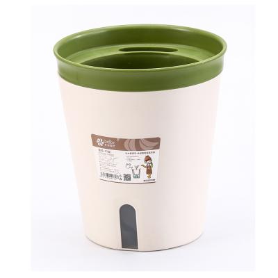 China New Eco-friendly Customized Buy Plastic Self Planter Plant Flower Pot Watering Supplier for sale