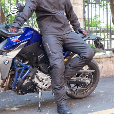 China SFK Motorcycle Black Waterproof Winter Riding Pants With Protective Armors Zipper Windproof Warm Motocross Thick Pants for sale