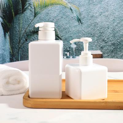 China Idealpak Square Wholesale Empty Cosmetic Bottles Hair Plastic Cosmetic Pump Bottle PETG With Dispenser Cap for sale