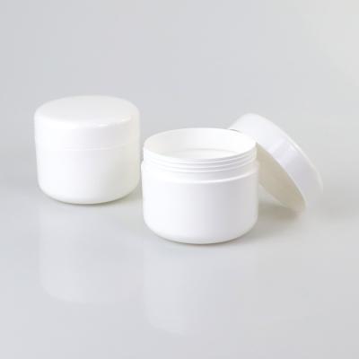 China Idealpak Cosmetic Custom Capacity 15 20 30 50 100 150 200 250 g 500g PP White Black Screw Cap Plastic Jar For Body Scrub for sale