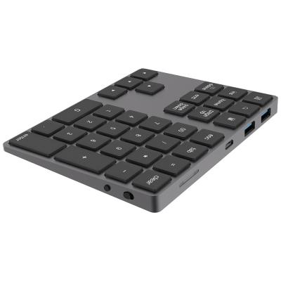 China WirelessBluetooth waterproof numeric keypad charging is suitable forapple notebook USB 3.0 hub function external keyboard for sale