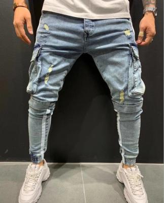 China Mens Denim Joggers Custom Striped Jeans Waterproof Vintage Blue Cargo Pockets Tape Jeans For Men for sale