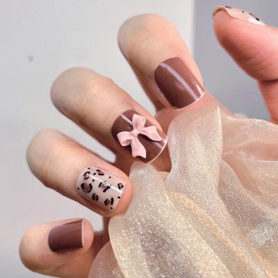 China Easy Apply Sanlong Full Cover Nail Tips Custom Leopard Print Bow Luxury Press On Nails Stick On Nails for sale