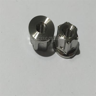 China Hot Selling Heavy Industry Custom Metric Titanium Hex Flange Head Nut For Racing Motorcycles for sale