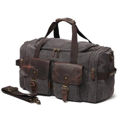 China Vintage Washed Canvas Duffel Bag Washed Expandable Waterproof Canvas Travel Bag For Weekend Men Handbags for sale