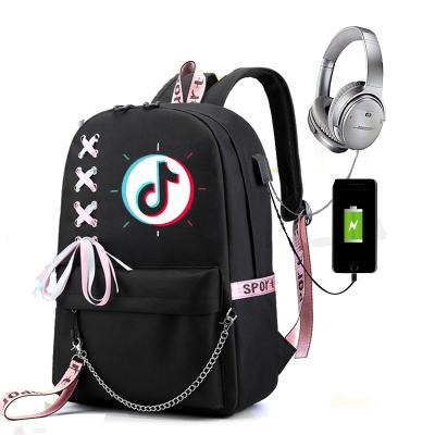 China With USB new style fashion tik tok hot selling backpack school bags college bag black unisex custom made backpack for kids for sale