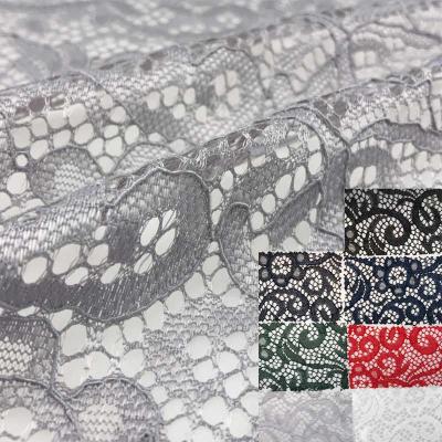 China Viable Custom Wholesale Cheap Circle African Lace Fabrics Black / White Lace Fabric France Good Price for sale