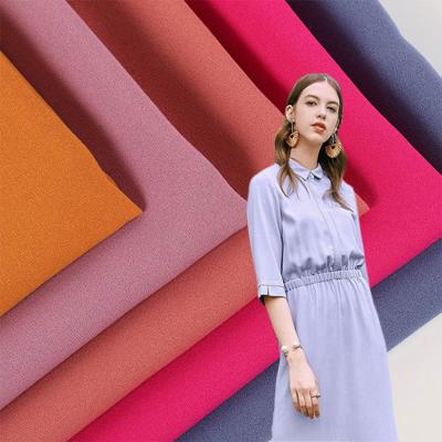 China Viable Customization Plain Solid Color Dress Fabric Fabrics Polyester Material Woven Fabric for sale