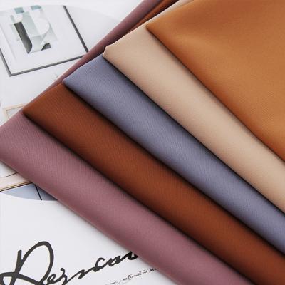 China Wholesale Viable Brown Polyester Fabric Polyester Twill Spandex Spandex Factory Shiny Fabrics for sale