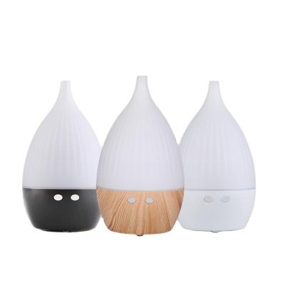 China Household Unique Randomly Adjusted 7 Colors Humidifier Aromatherapy Machine for sale