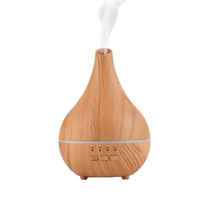 China 2022 Affordable Hot Selling Car Wood Grain Aroma Diffuser Air Humidifier Essential Oil Diffuser for sale