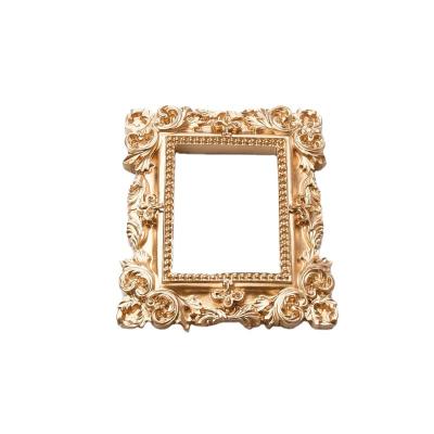 China 2023 Enviromentally Friendly Wholesale Resin Photo Frame Mini Picture Frame Ornaments Custom Size Victorian Style Golden Decoration 2023 for sale