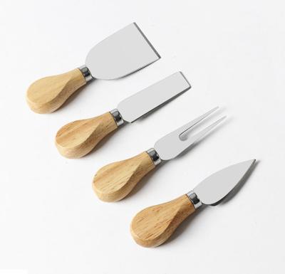 China Wholesale  4PCS Cheese Knives With Rubber Wooden Handle For Cheese Food for sale