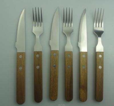 China Promotion Tableware Steakhouse Steak Knives And Forks handle is wood for sale