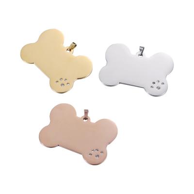 China CLASSIC Pet Dog Accessories Stainless Steel Gold Glitter Print Paw Pendant Pendant Glowing Crystal Dog ID Charm for sale