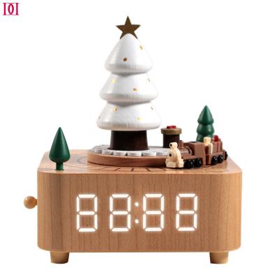 China Custom Gifts Dolphin Industry BR Christmas Orgel Clock Wind Up Wooden Music Box With Turning Small Train And Time Display for sale