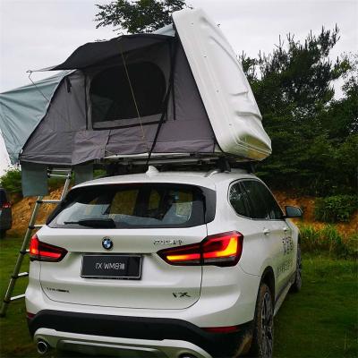 China 2022 Extended Type Maggiolina 4 Person Offroad Outdoor Camping Shell Roof Top Tent Tough For Sale for sale