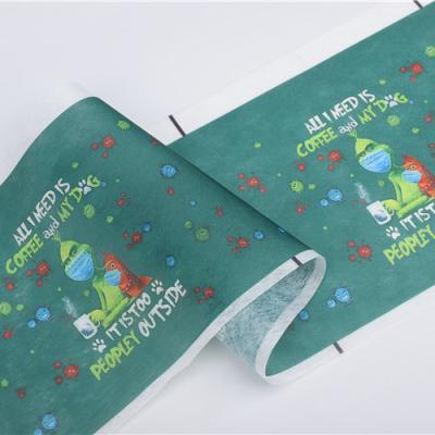 China Breathable Spunlace Printing Christmas Series Nonwoven Waterproof Printing Medical Nonwoven Fabric for sale