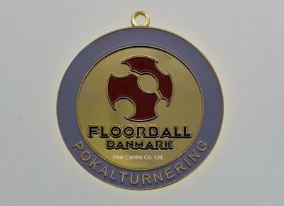 Cina L'oro antico ha personalizzato le medaglie/pallavolo della corsa 5K o medaglie di Floorball Danmark in vendita