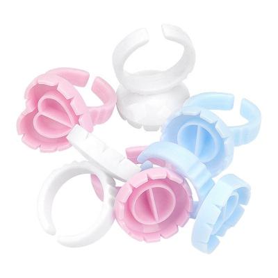 China Hot Selling Flower Shape Glue Ring Pink White Blue For Eyelash Extension Wholesaler Vendor Glue Tina Ring for sale