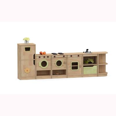 Cina Kindergarten solid wood furniture water-based paint role-playing children's combination cabinet in vendita