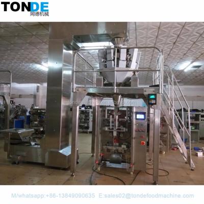 China Full Automatic Vertical Pillow Bag Grain Granule Filling And Rice Packing Machine Te koop