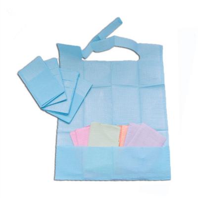 China 1ply paper +1ply film pocket disposable depth 10cm pe coated paper dental patient apron for dentist for sale