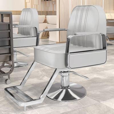 China Modern BOjue Salon High-end hair salon furniture armchair can rotate and lift stainless steel black metal barber chair for sale