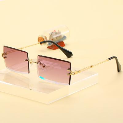 China Fashion Small Square Frame Ladies Eyeglasses Trend Luxury Designer Yellow Gradient Rimless Glass Women Sunglasses UV400 for sale