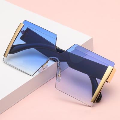 China Custom Women Oversized Fashion Logo Rimless Gradient Eyeglasses UV400 Glass Ladies Sun Glasses Hot Sale Fashion Sunglasses Shading Sun Glasses for sale