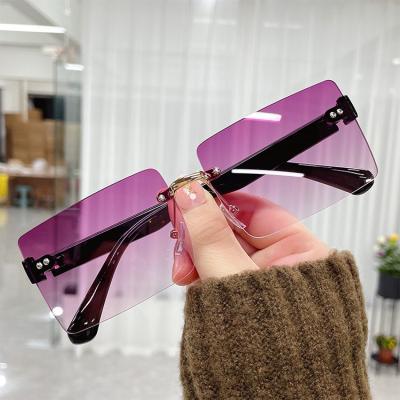 China Rimless Gradient Sunglasses Women UV400 Vintage Ocean Glass Square Small Frame Sun Glasses Personality Square Glasses for sale