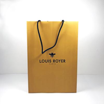 China High Quality Eco-friendly Sustainable Emboss Boutique Paper Shopping Bag Gift Bag for sale