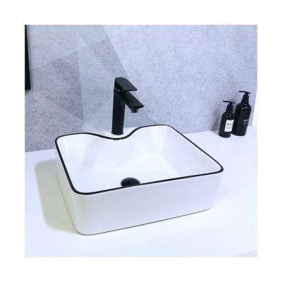 China 2022 Hot-selling modern simple designs round shape black line with pattern above countertop basin for hotel for sale