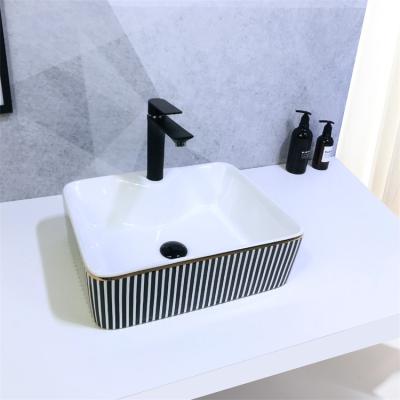 China New Arrival Modern Hot-selling Rectangular Black Stripe Stain Resistant Bathroom Countertop Basin For Hotel for sale