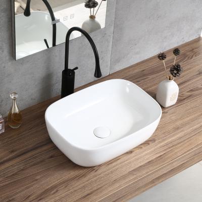 China Modern Design America Glossy White Color Basin Bathroom Ceramic Countertops Bowl Wash Hand Sinks for sale