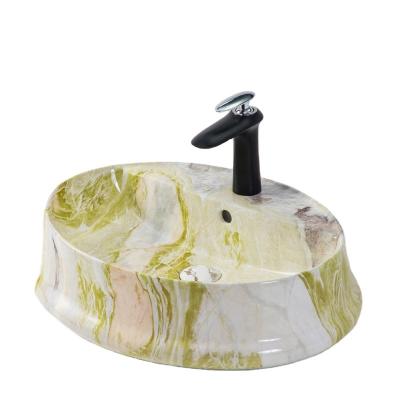 China Wholesale Modern Ceramic European Style Counter Top Oval Wash Basin Sinks Drop Down Marble Standing Sink for sale