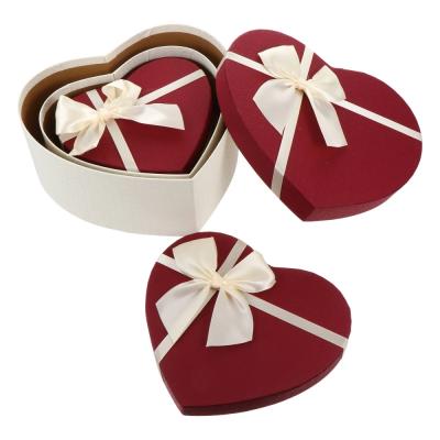 China Bow-knot Luxury Heart Shaped Gift Boxes Recycled Materials Exquisite Paper Gift Present Boxes Christmas Gift Boxes for sale