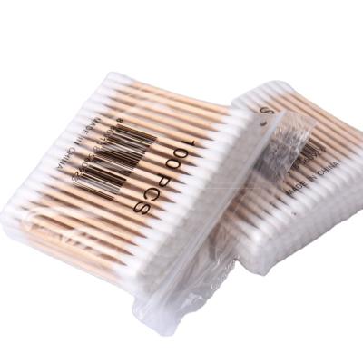 China 100pcs Disposable Natural Wooden Earpick Stick Cotton Pads for sale