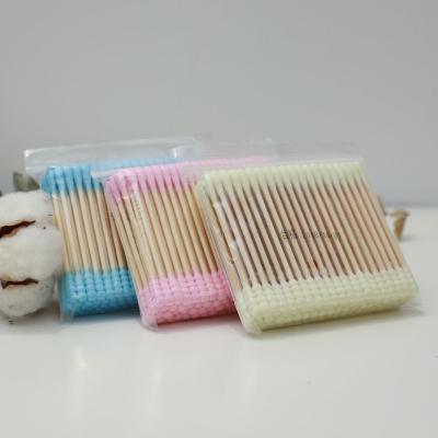 China 100pcs Disposable Colored Cotton Bamboo Stick Make Up Cotton Q Tips for sale