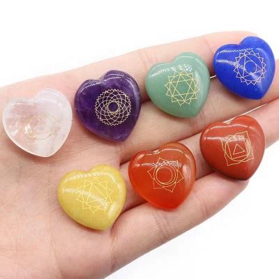 China Europe Engraved Chakra Set Palm Stone Crystals Heart Shaped Stones To Pocket Crystals Seven Chakra Hearts Carving for sale