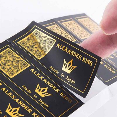 China Custom Gold Foil Self Adhesive Glossy Label Waterproof Personalized Sticky Paper Printing Hot Stamping Sticker for sale